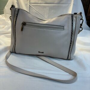 The Sak Light Ivory Pebbled Leather Crossbody with Snake Trim